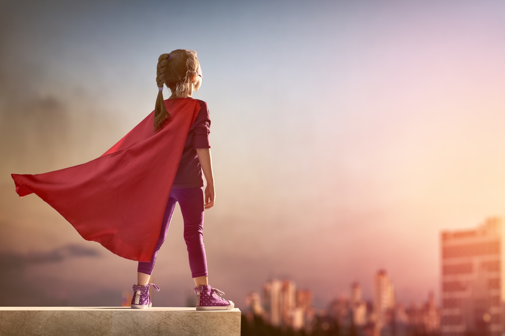 Excited group of business people superhero girl